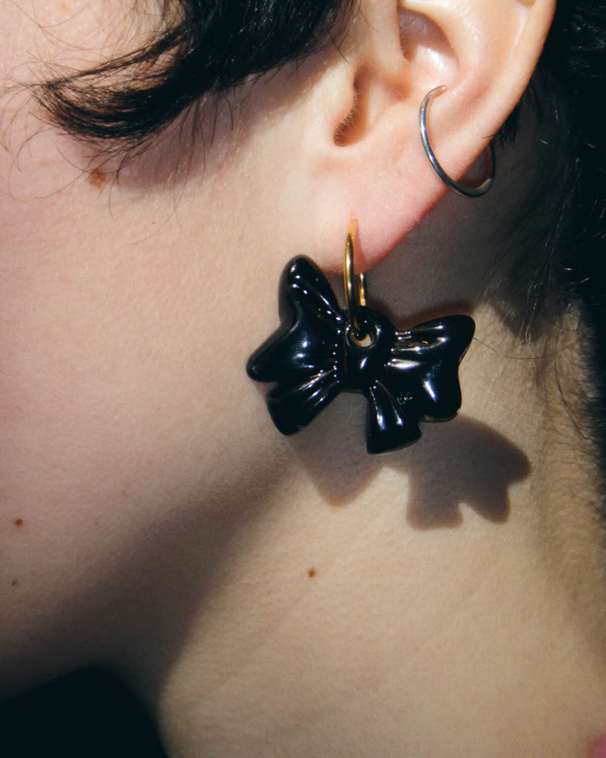 ceramic black bow earrings levens