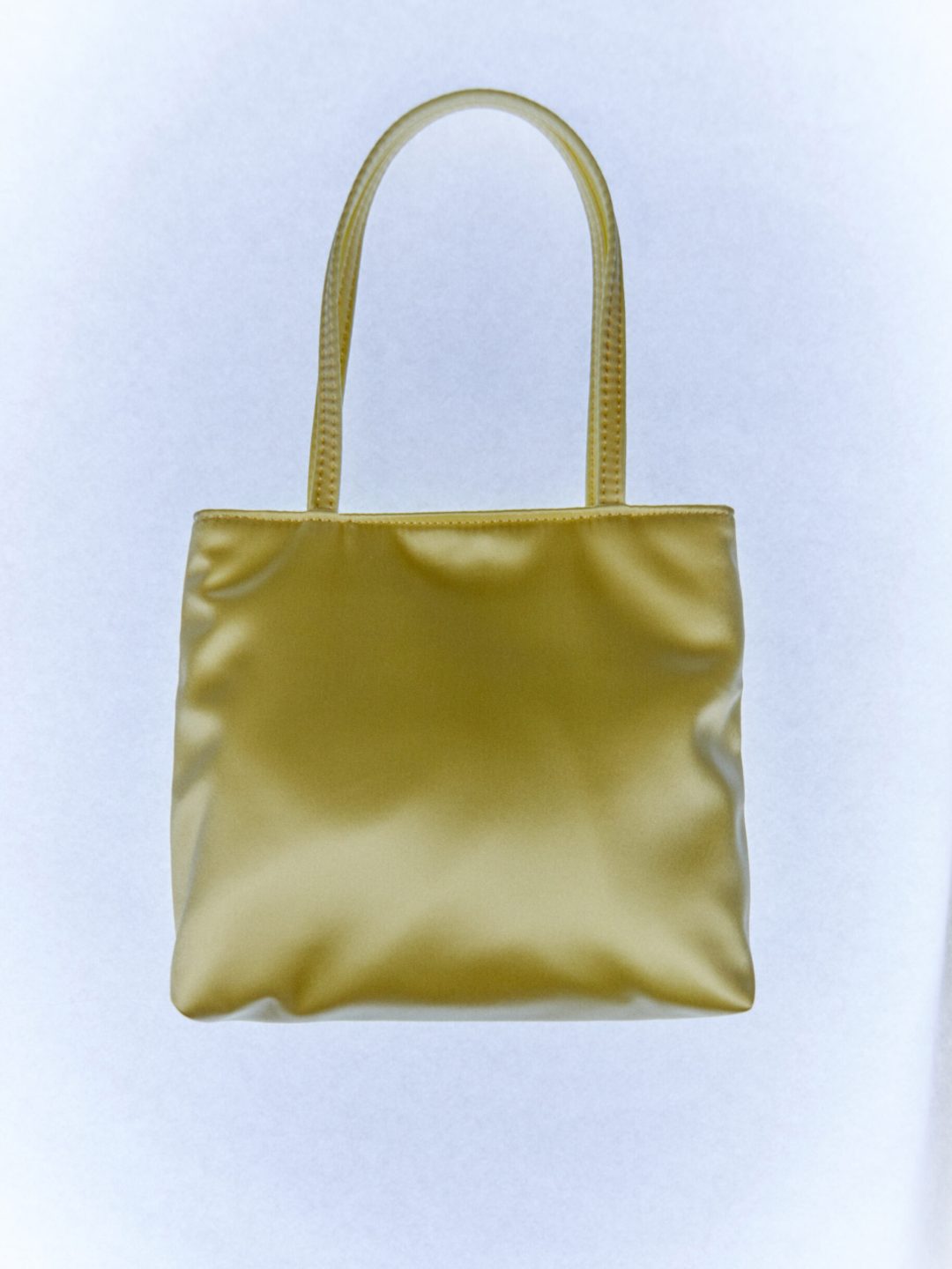 little silk bag yellow hai muy frágil