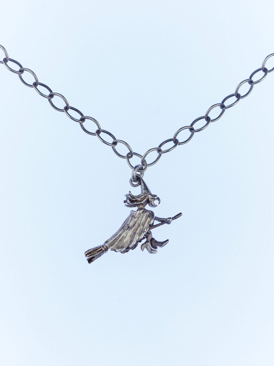 witch on a broom silver necklace amphitrite's treasure